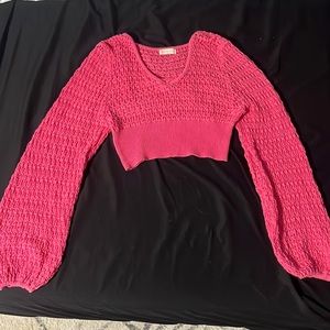 Get cozy and cute this winter with this pink sweater